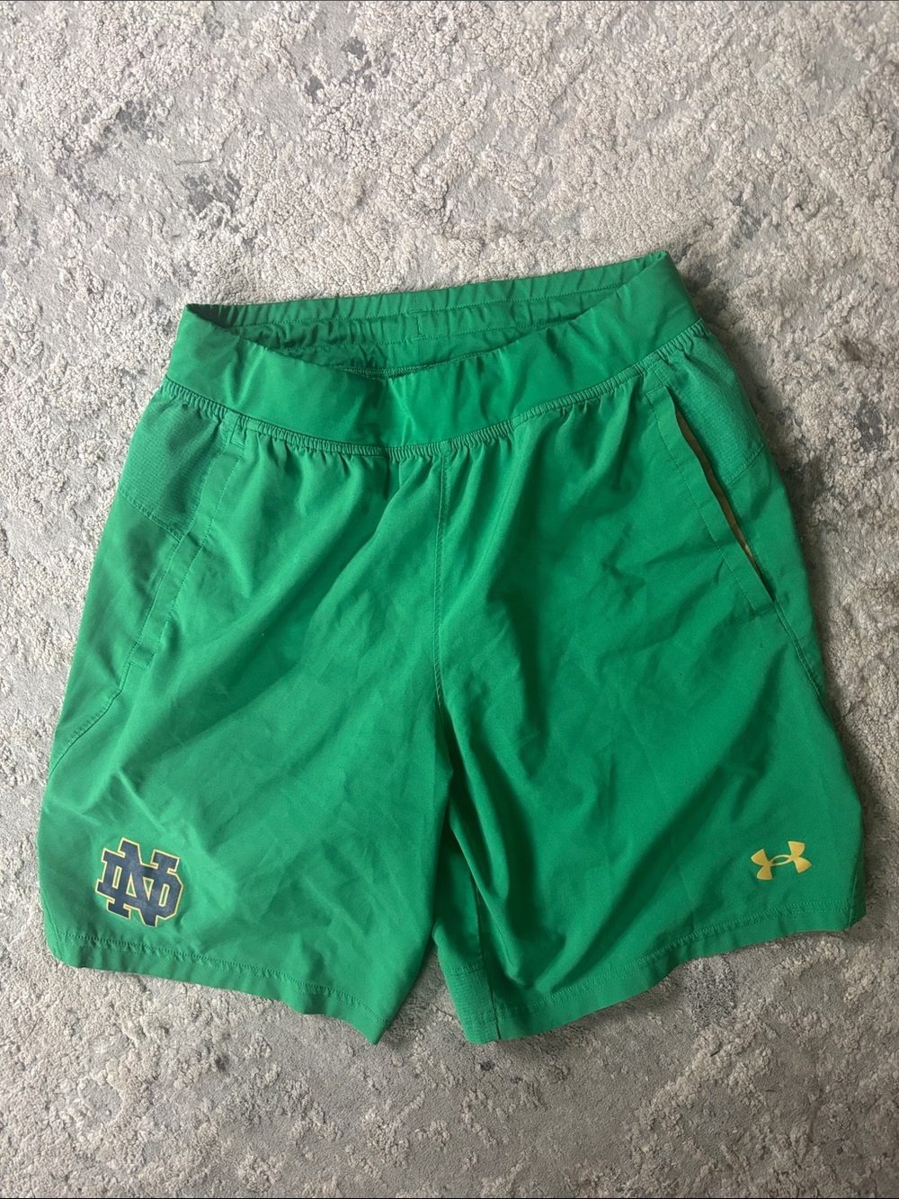Under Armour Women's Green Athletic Shorts with Yellow Logos